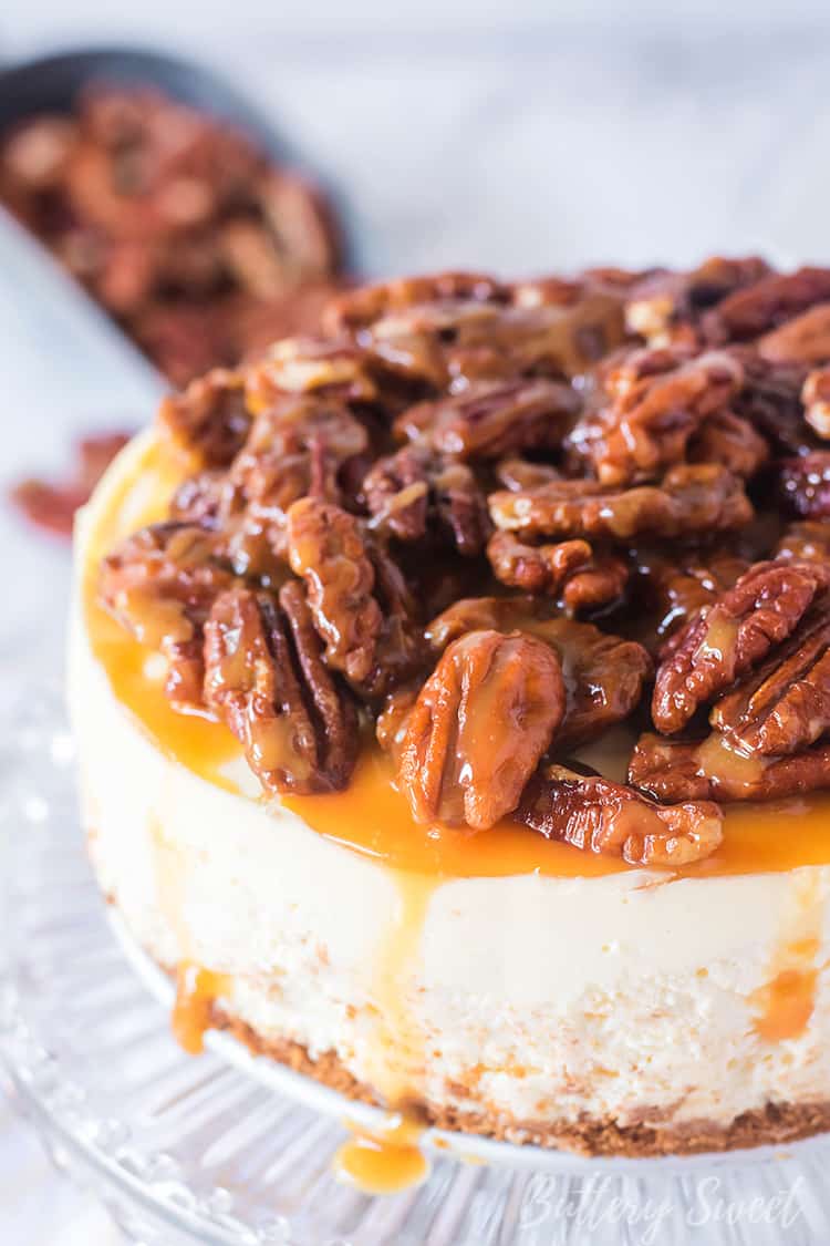 Instant Pot Pecan Pie Cheesecake on a cake plate