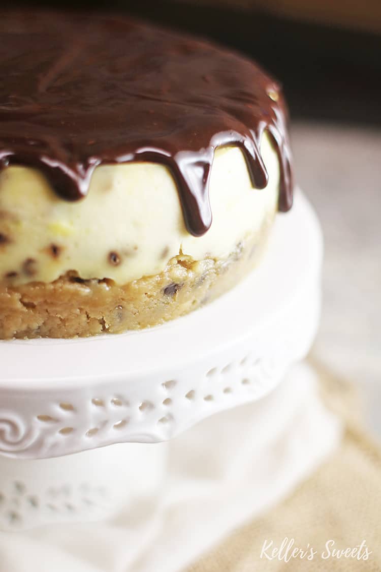ganache dripping down the side of Instant Pot Chocolate Chip Cookie Dough Cheesecake