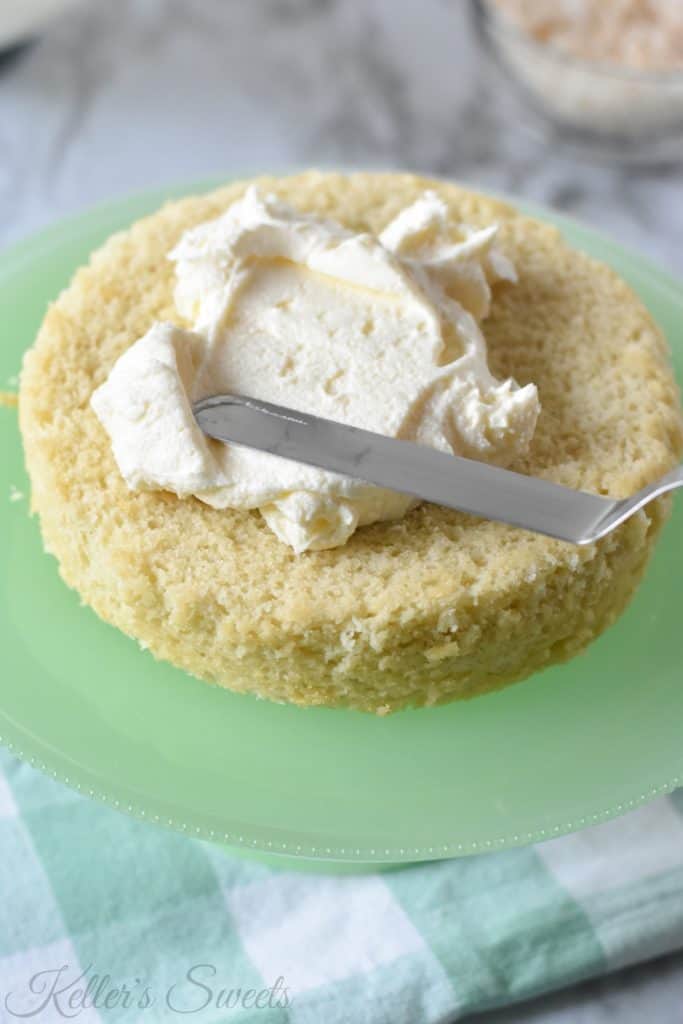 The Best Toasted Coconut Cake| This cake is quick, easy, and super tasty! It will be a guaranteed to be a hit. This would be perfect for the upcoming Easter holiday!| https://butterysweet.com/blog/the-best-toasted-coconut-cake