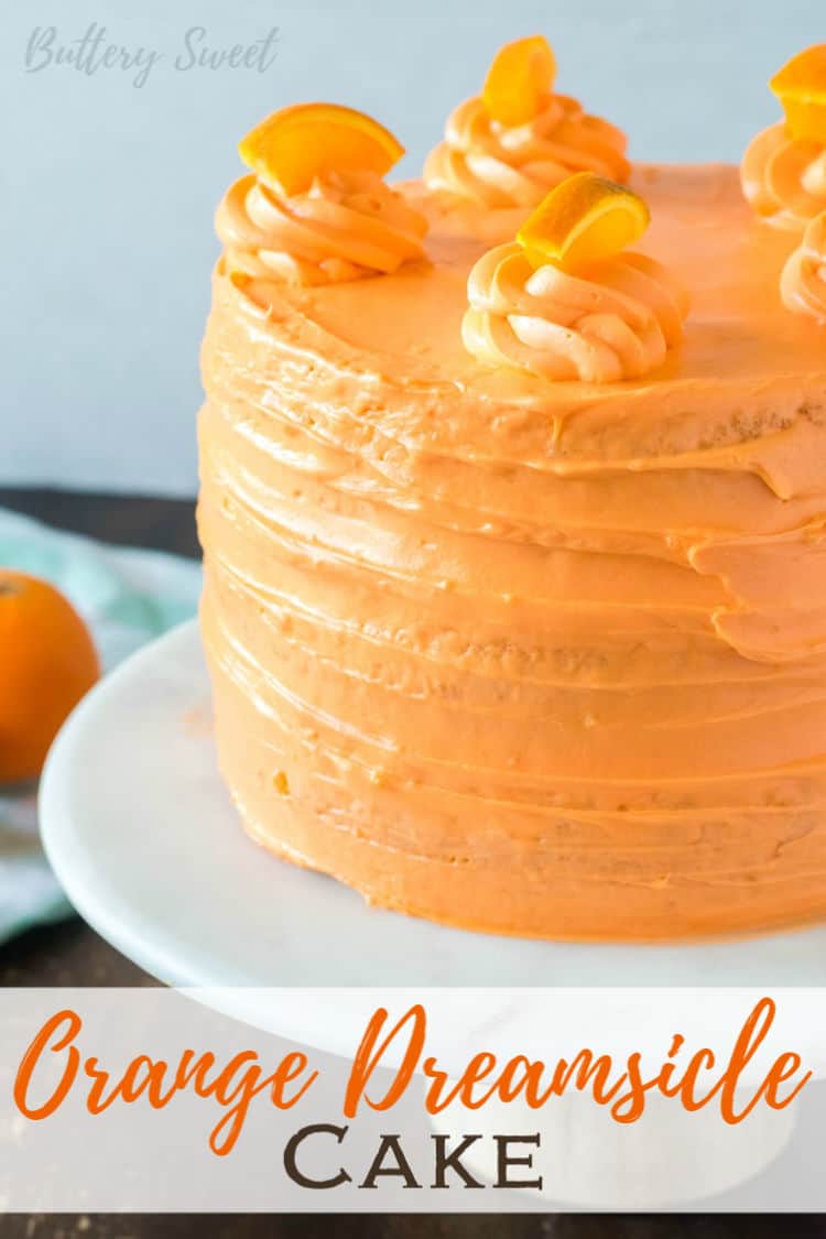 Orange Dreamsicle Cake on a white cake stand