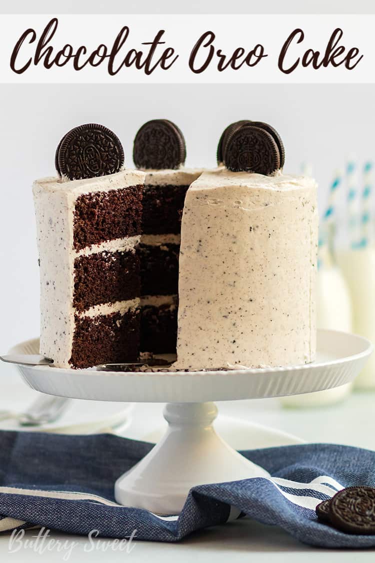 Sliced Chocolate OREO Cake with buttercream and OREO garnish on a white cake stand