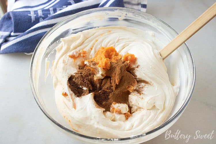 adding sweet potatoes and spices to Instant Pot Sweet Potato Cheesecake recipe