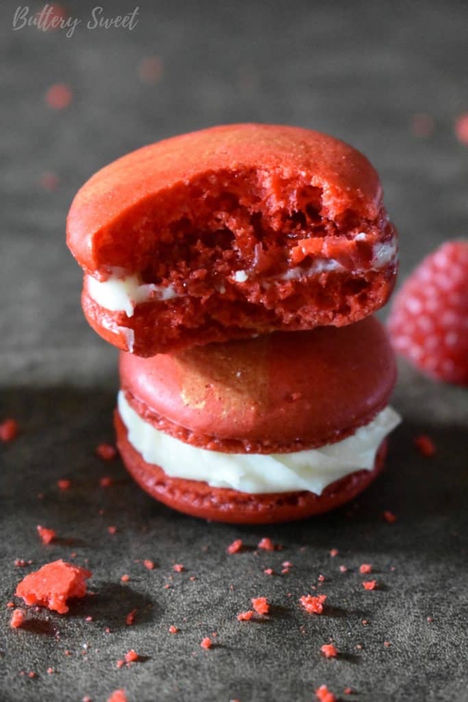 White Chocolate Raspberry Macarons with a bite taken out