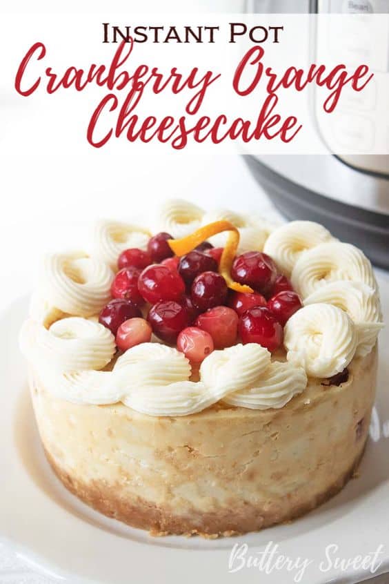 Instant Pot Cranberry Orange Cheesecake topped with cream cheese frosting and fresh cranberries.